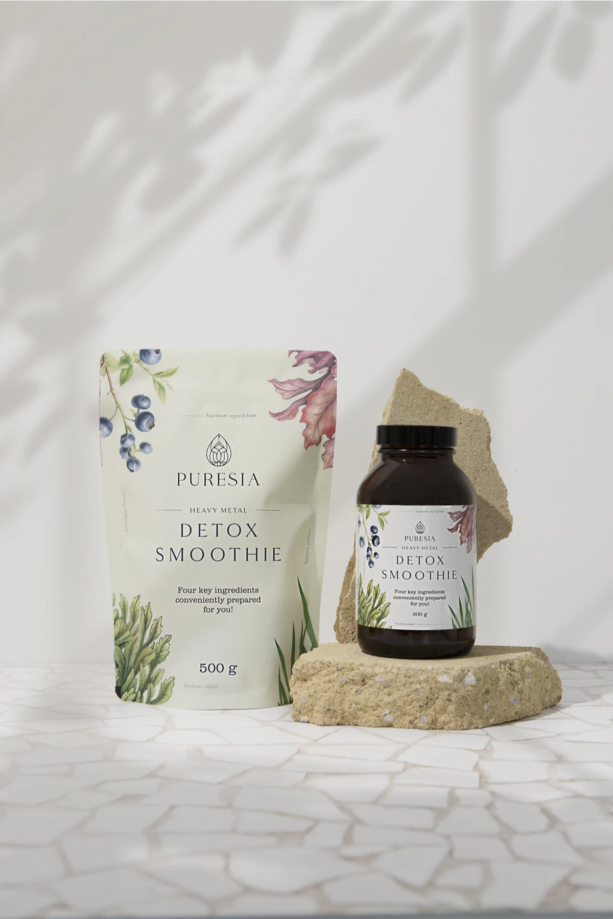 Puresia's detox smoothie mix in a packet and a bottle